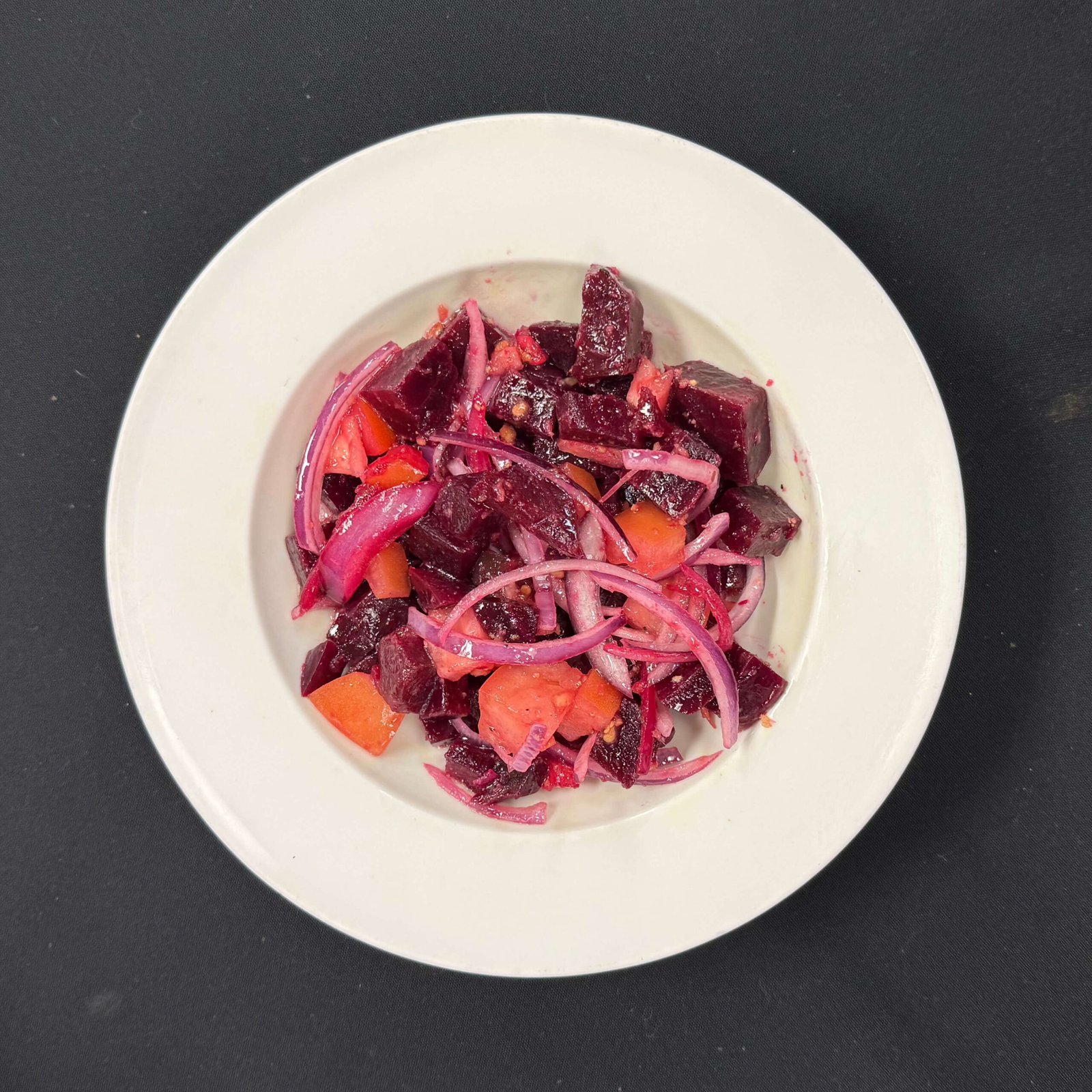 Ethiopian Keysir—tender beets and carrots slow-cooked with onions and a hint of Ethiopian spices, served on injera.